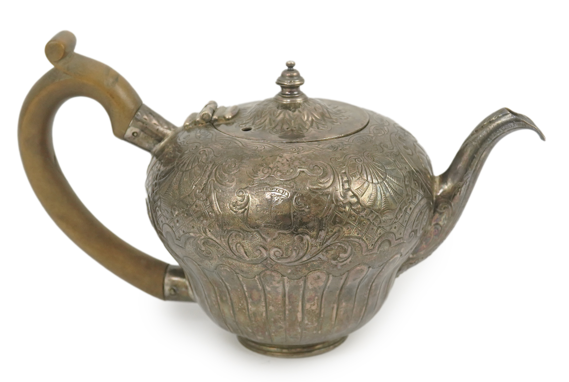 An 18th century Irish silver inverted pyriform bachelor's teapot, maker E.R